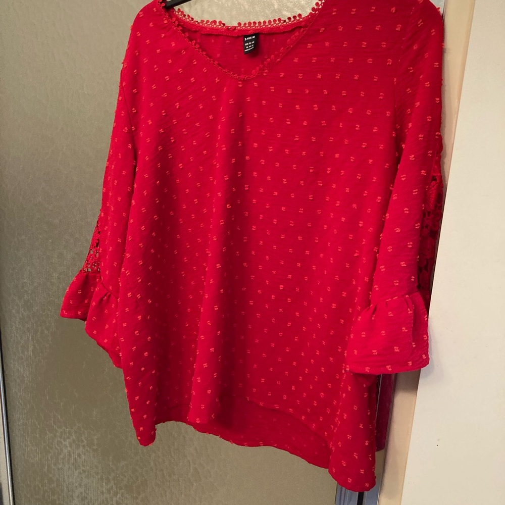 Woman’s red top